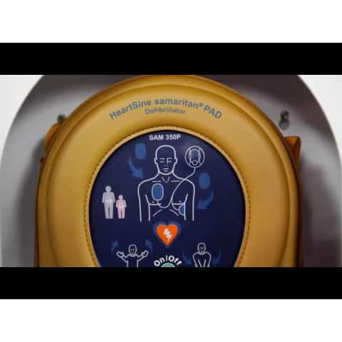 An image of a HeartSine Samaritan PAD 500P Semi Automatic AED Defibrillator with a person receiving CPR Advisor assistance.