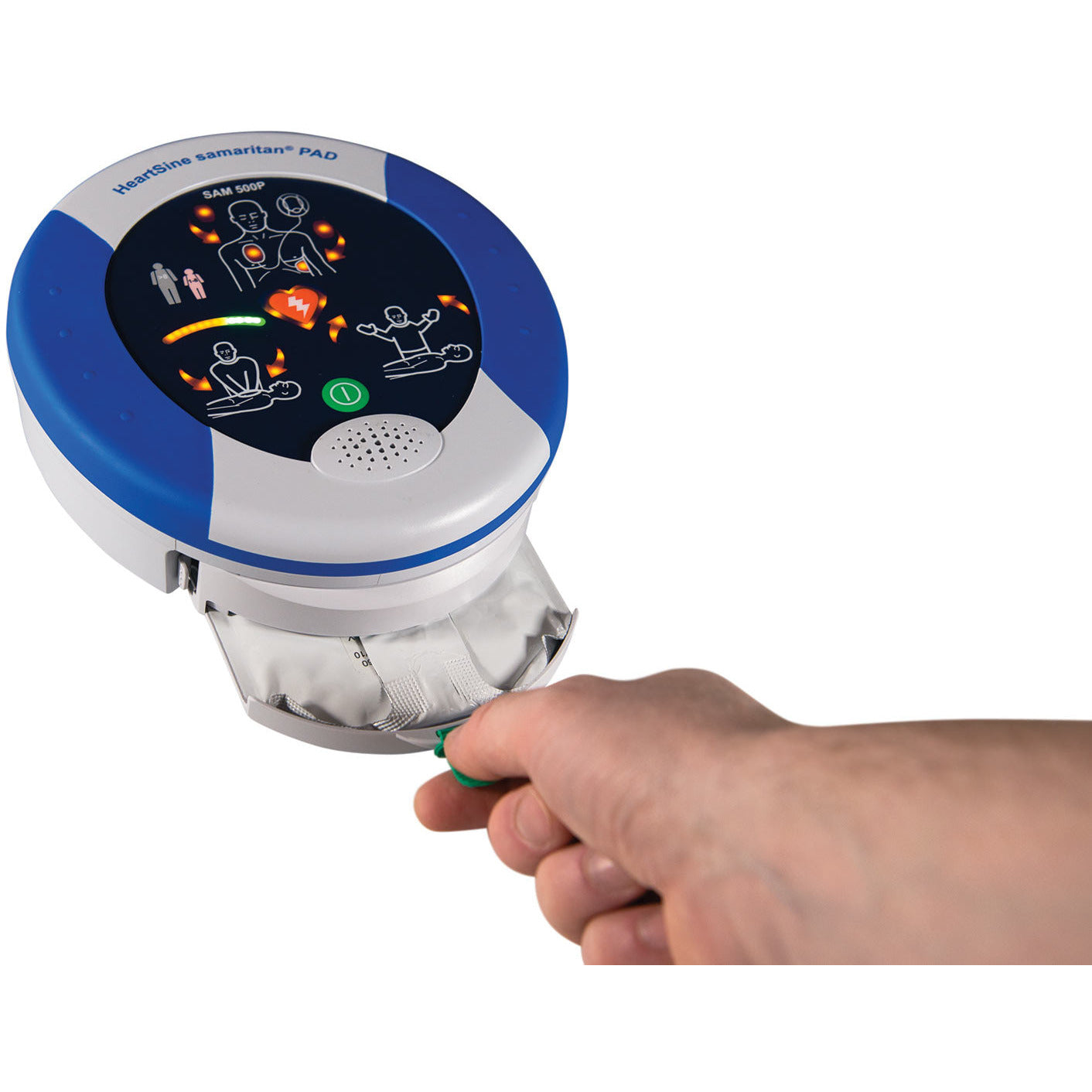 A hand is holding a HeartSine Samaritan PAD 500P Semi Automatic AED Defibrillator, used for effective CPR during cardiac arrest.